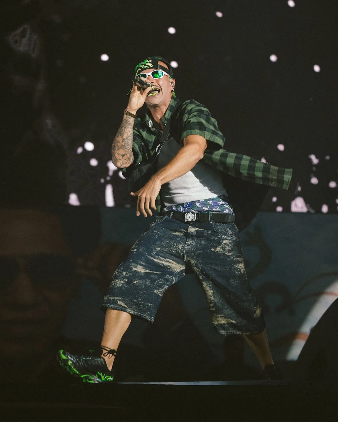 Feid on stage in Medellín wearing the Salomon ACS Nexxt