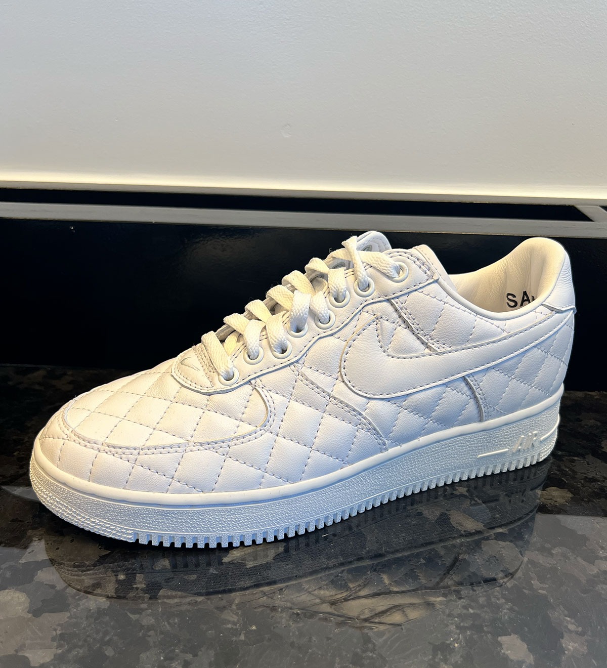 Nike Air Force 1 Low Quilted in all-white, side view
