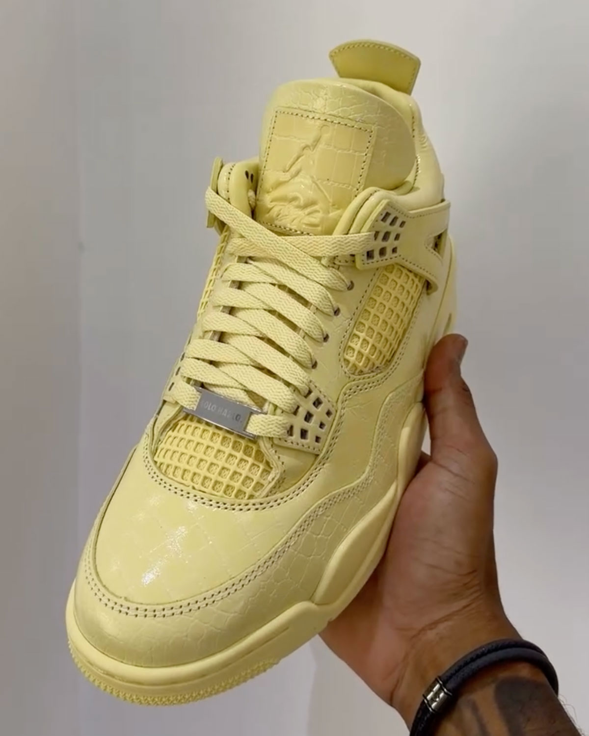 J Balvin x Air Jordan 4 'Lemonade' detail hiel