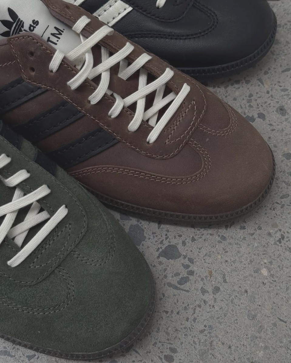Song For The Mute x adidas Samba in black, brown and green side by side