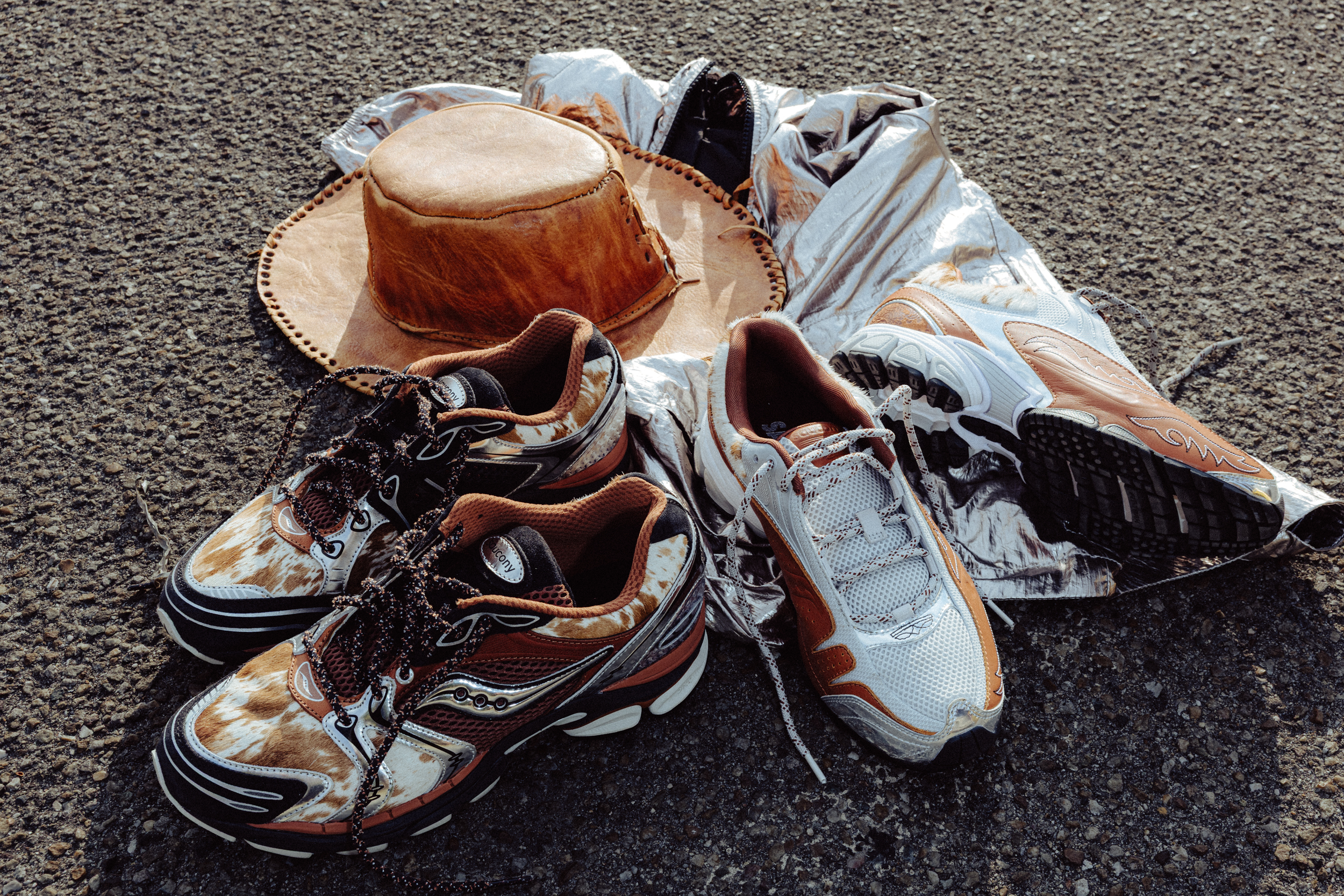 Saucony Space Cowboy collection with a leather cowboy hat