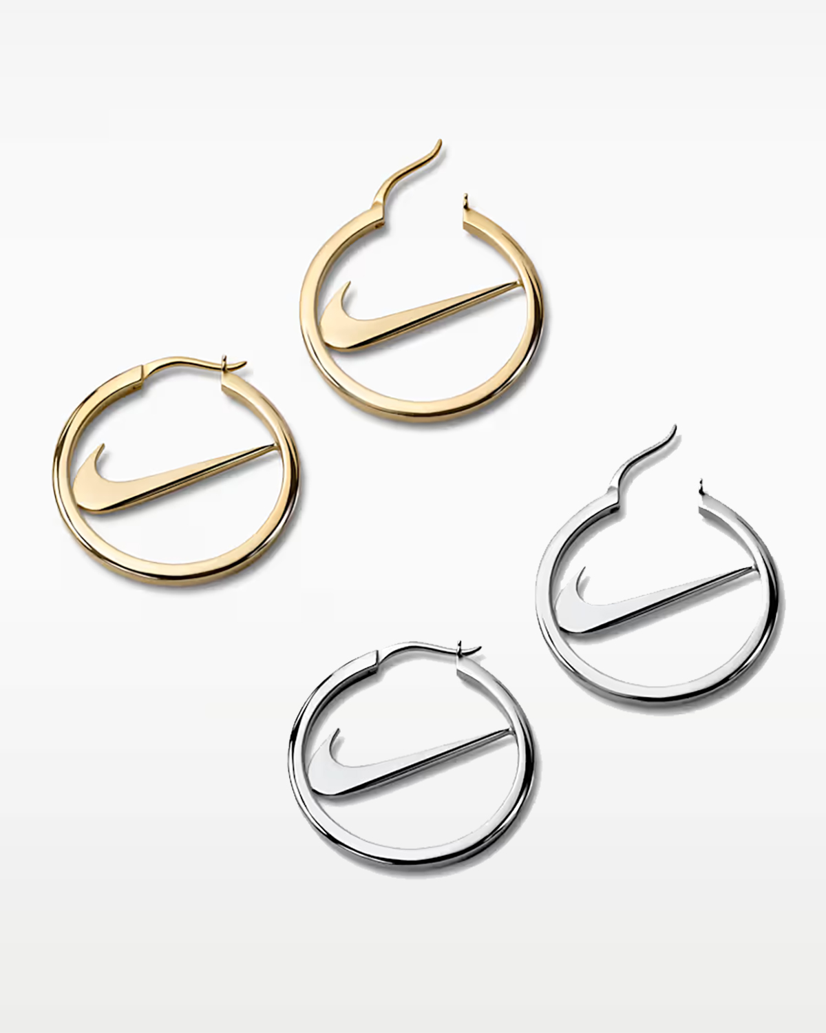 Nike Swoosh Hoop Earrings in silver and gold