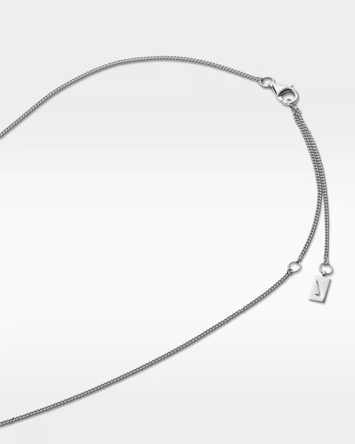 Nike Swoosh Necklace clasp with Swoosh tag