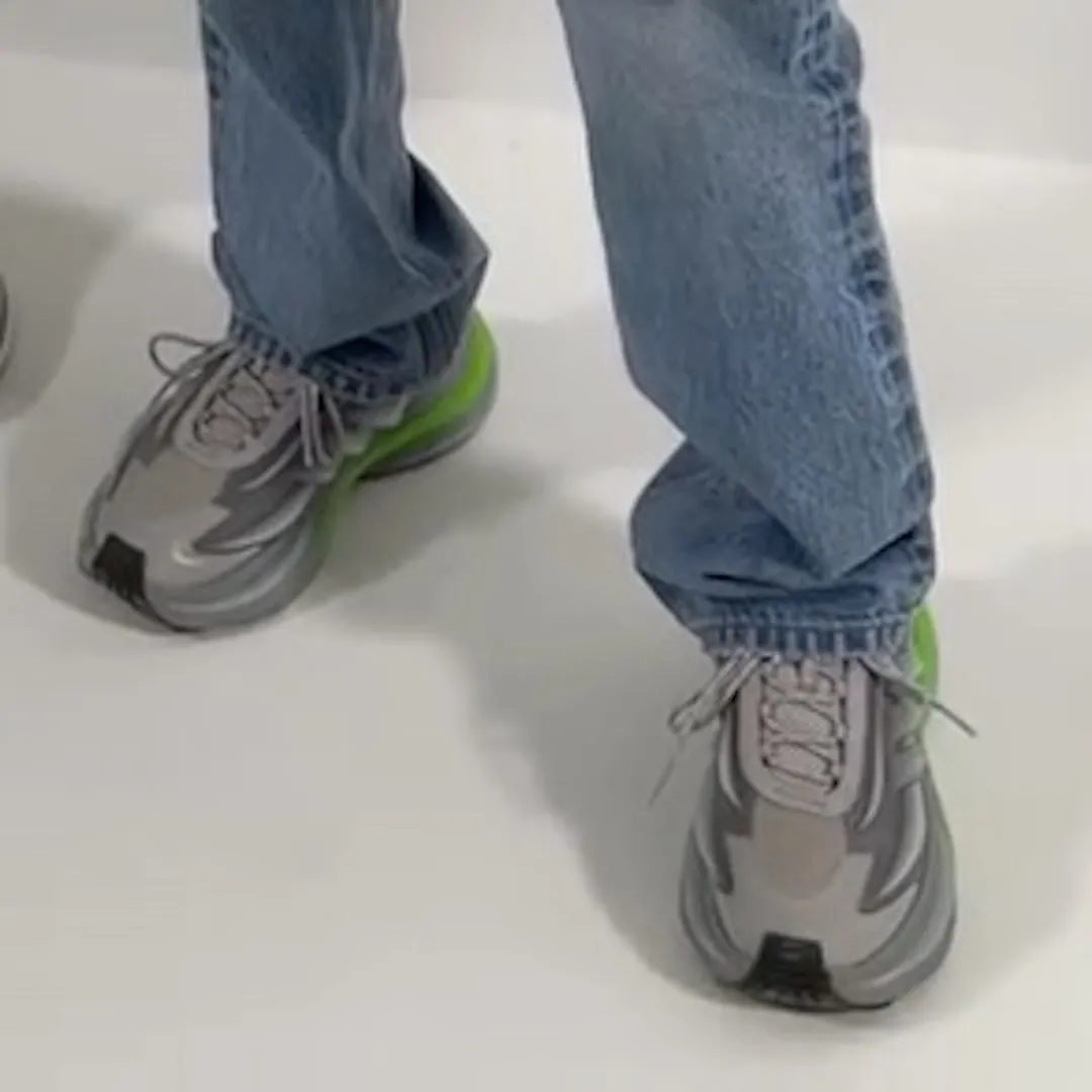 Detail of the grey upper with neon green accents on the adidas Adistar Jellyfish V2