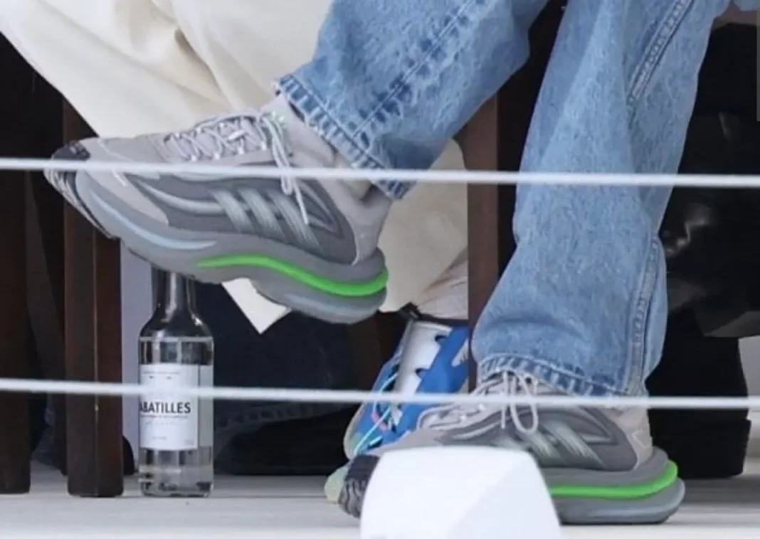 Pharrell Williams wearing the possible adidas VIRGINIA Adistar Jellyfish V2 in grey and neon green