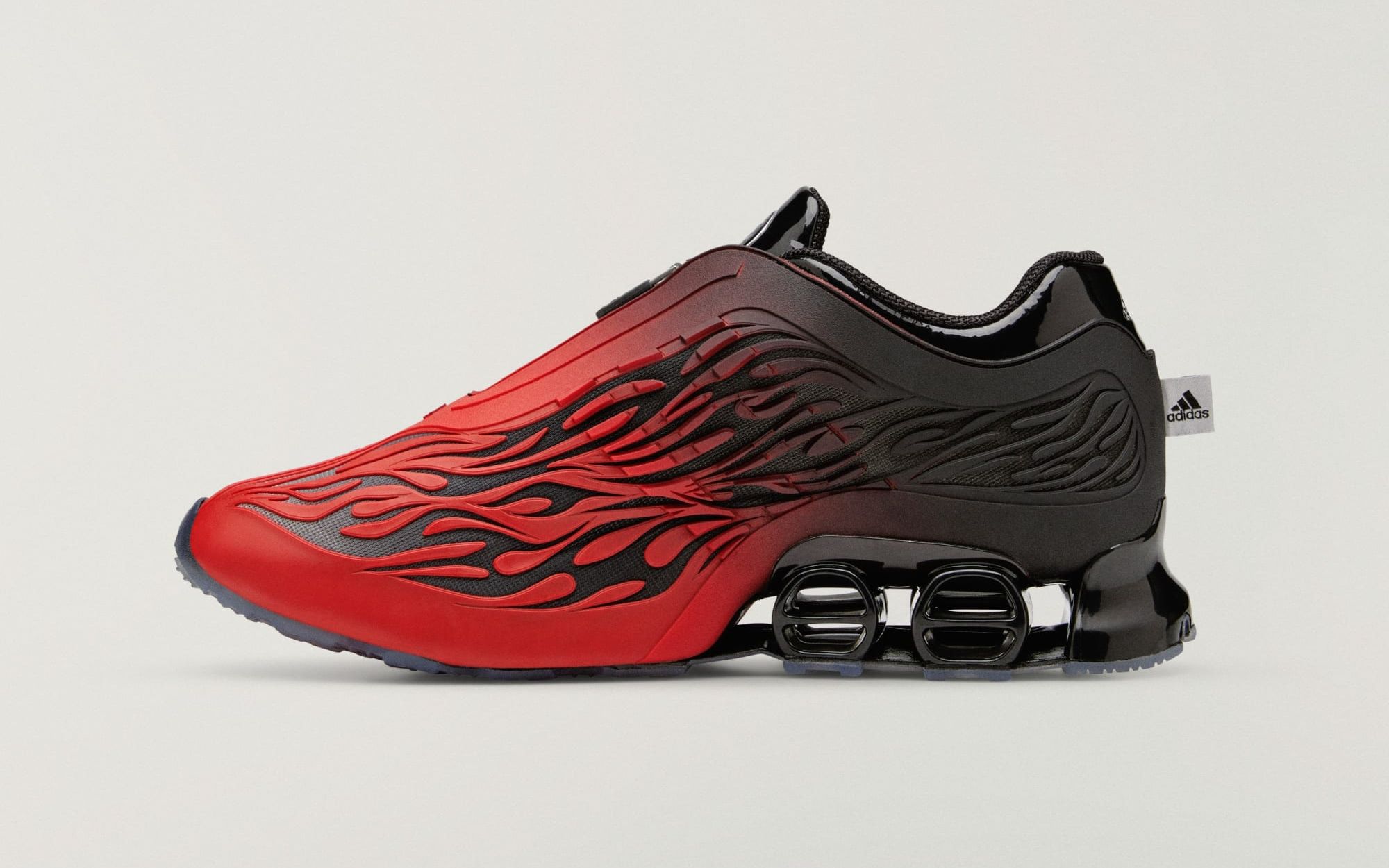 Side view of the Hellstar x adidas Megaride S2 Bright Red