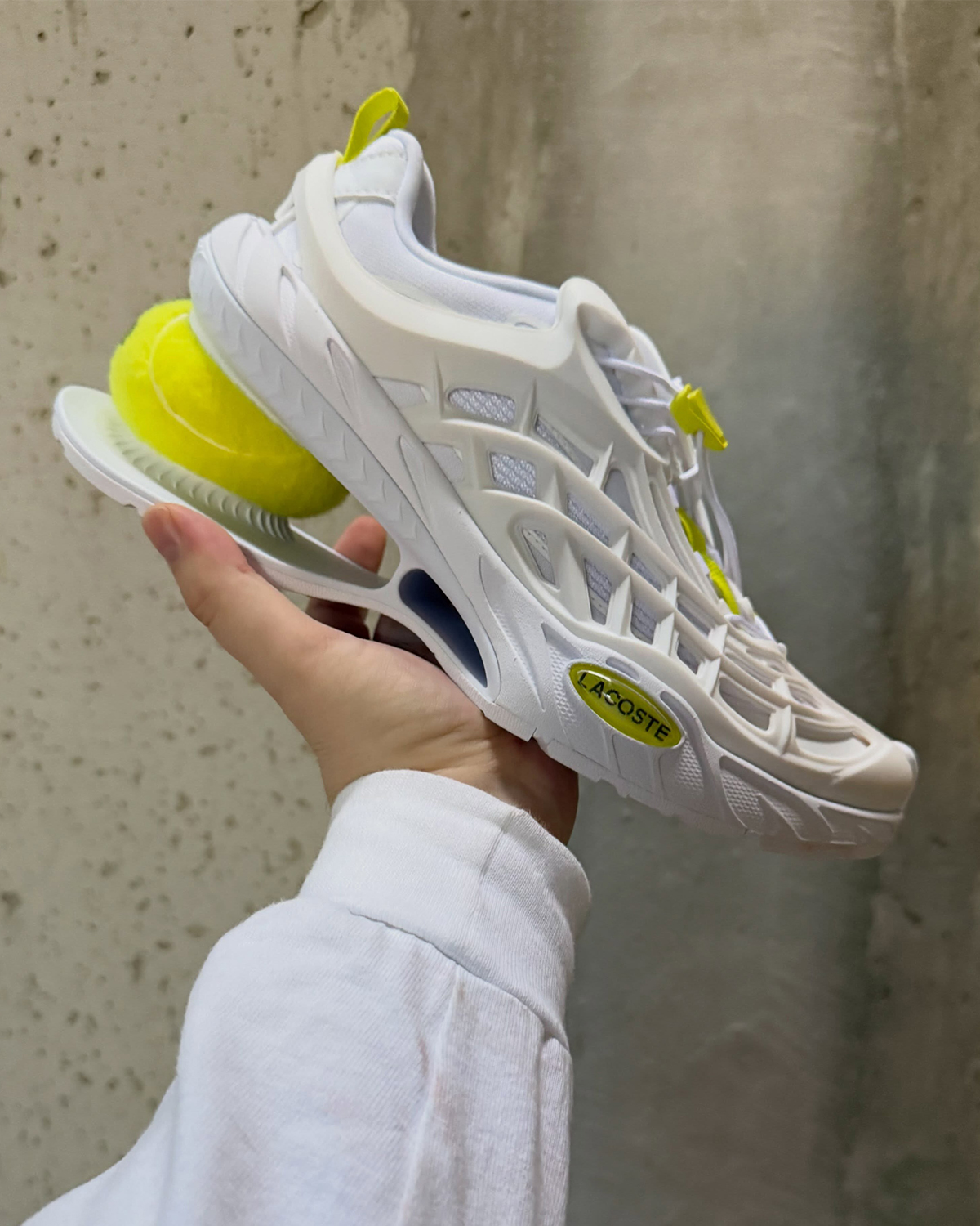 Lacoste Ace-T zijaanzicht met TPU-frame