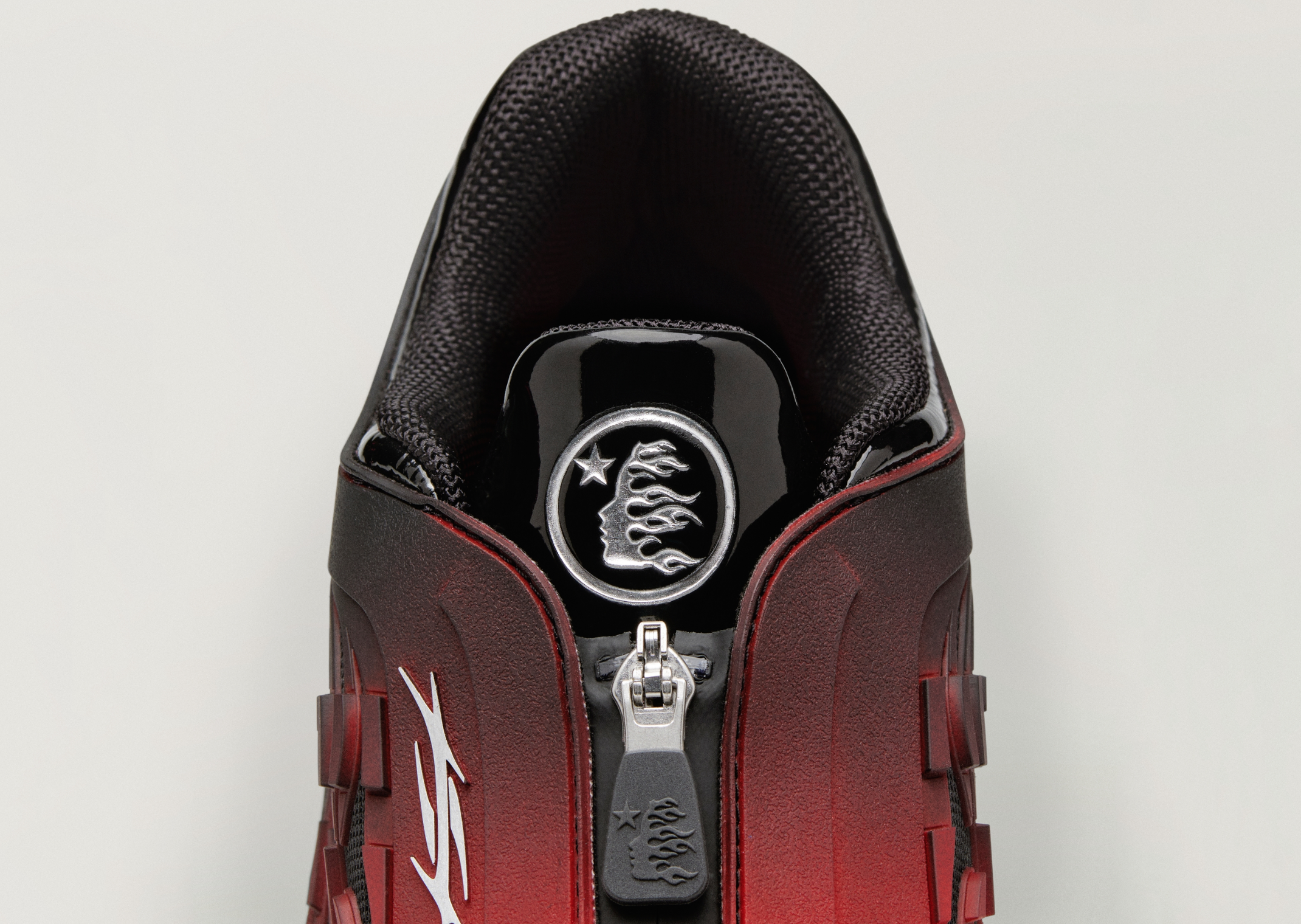Hellstar x adidas Megaride S2 tongue and zip detail