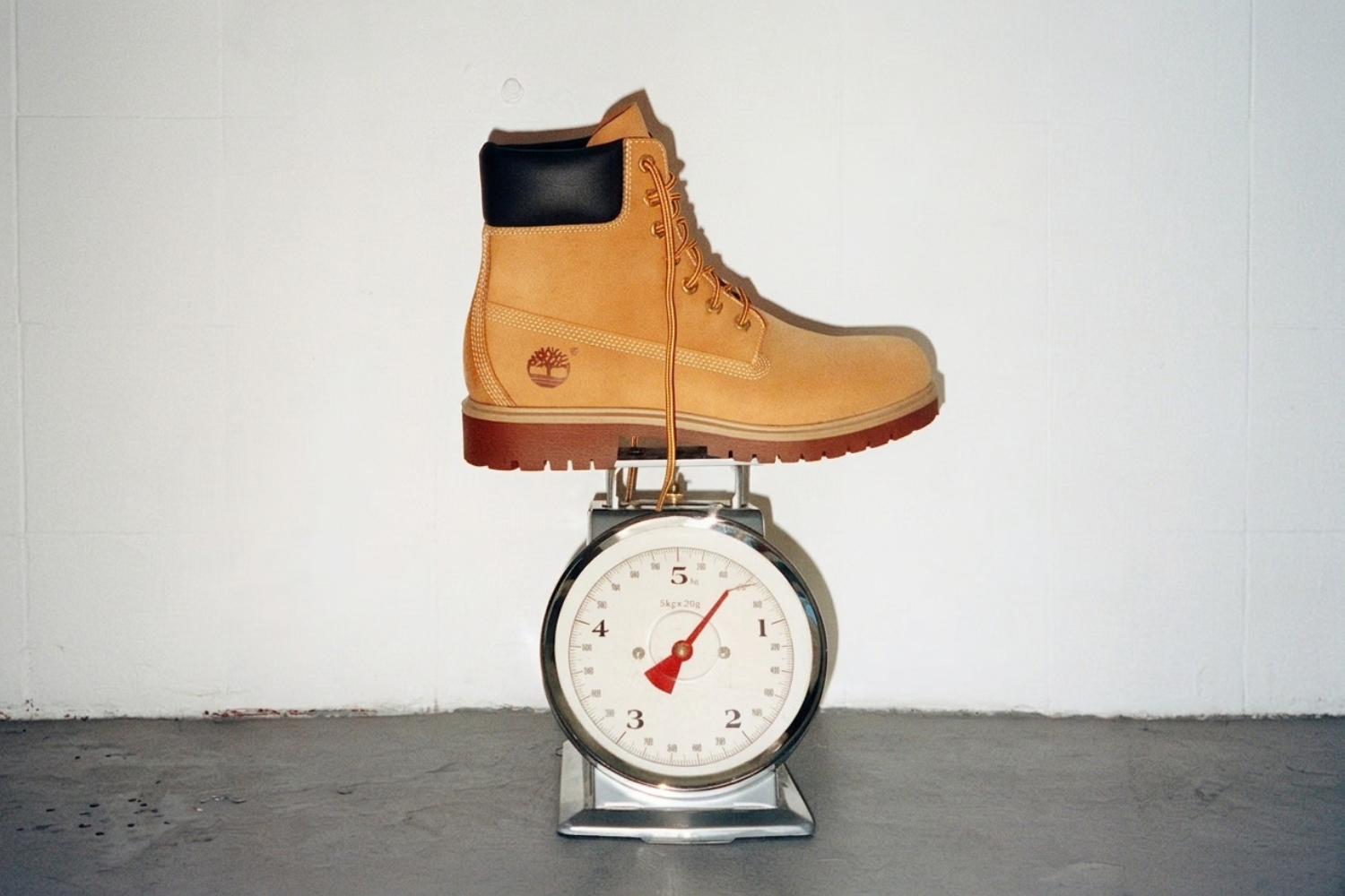 Timberland 25 6-Inch Waterproof Boot in Yellow on a scale