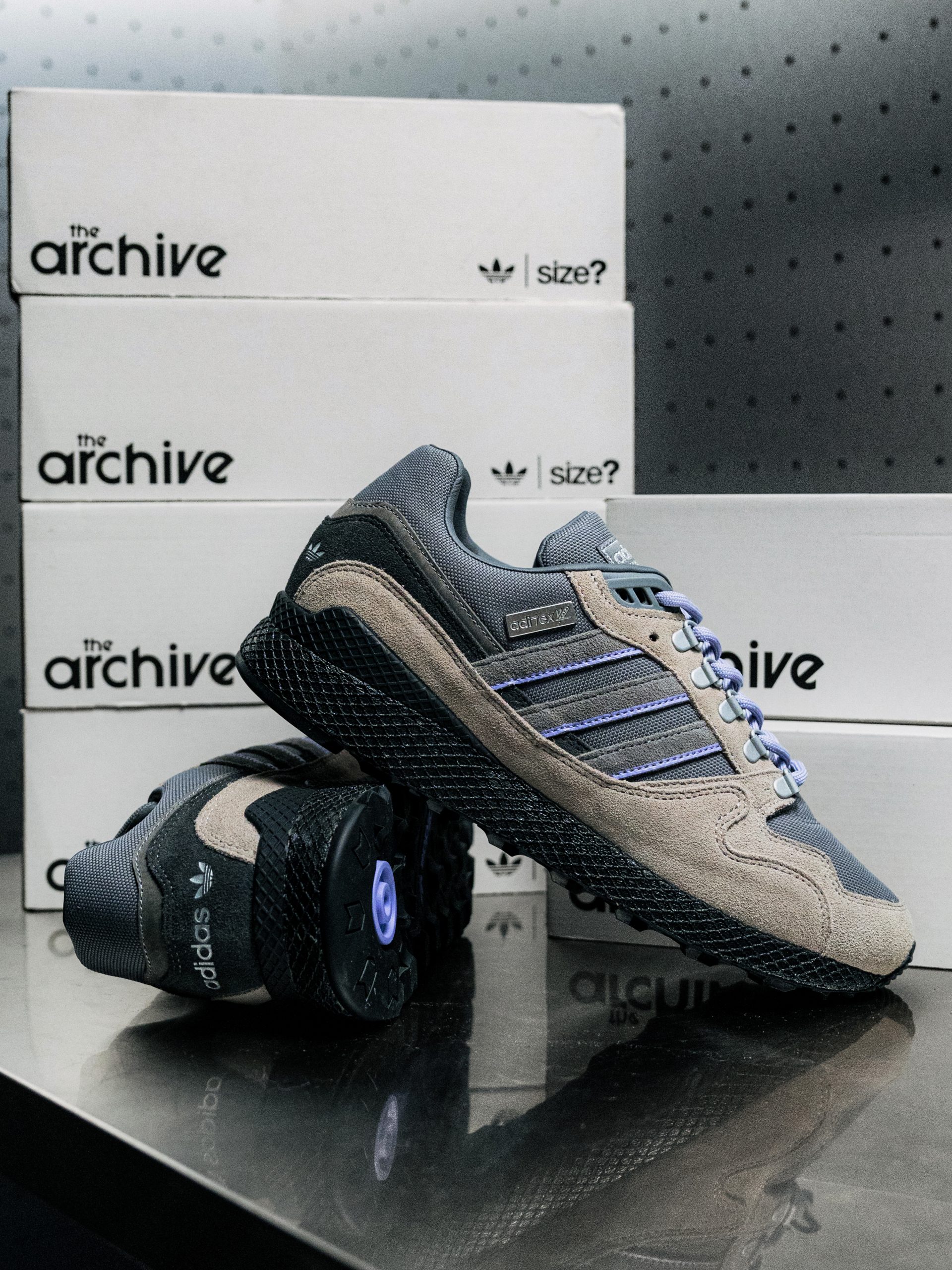 Grey adidas Oregon Ultra Tech Aditex on The Archive boxes