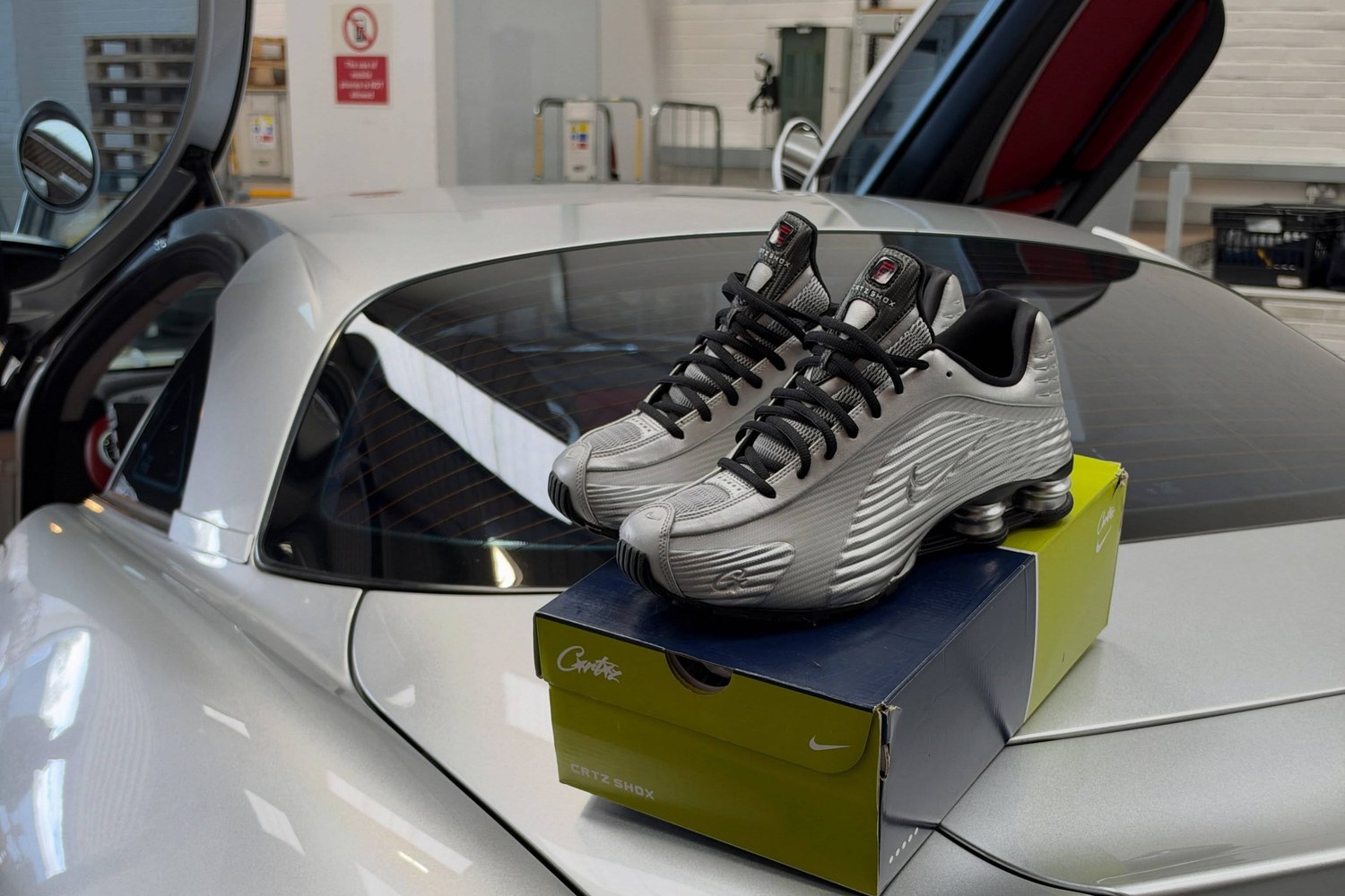 Corteiz x Nike Shox R419 Metallic Silver on a CRTZ SHOX box