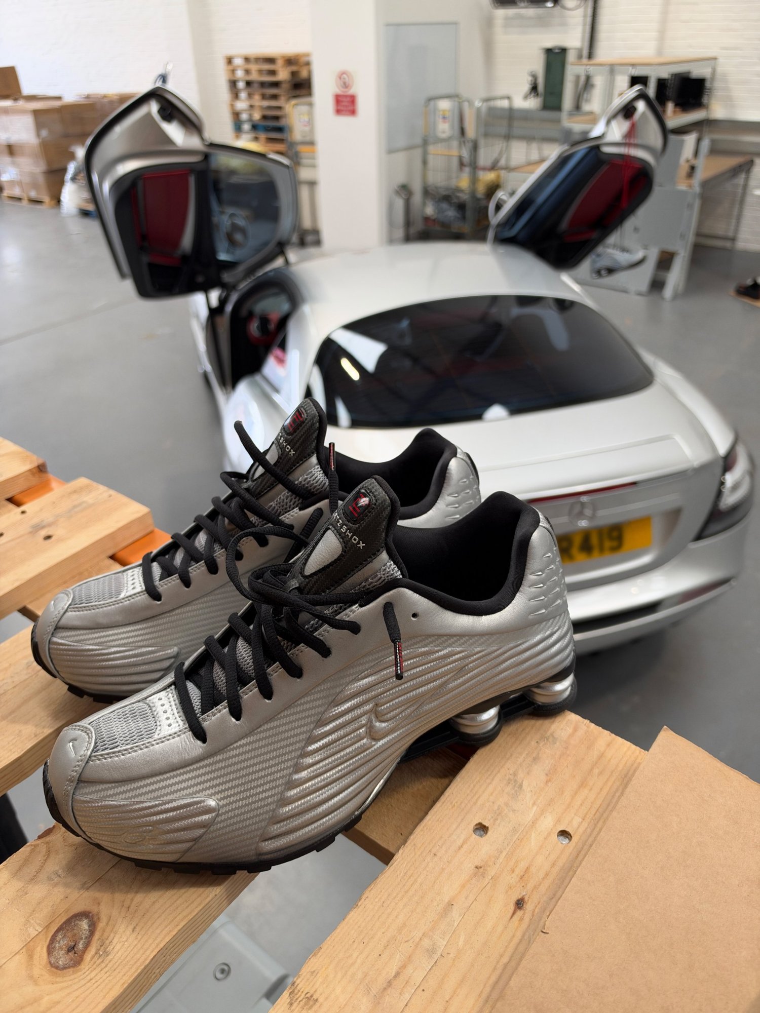 Corteiz x Nike Shox R419 in front of a Mercedes SLR with an R419 number plate