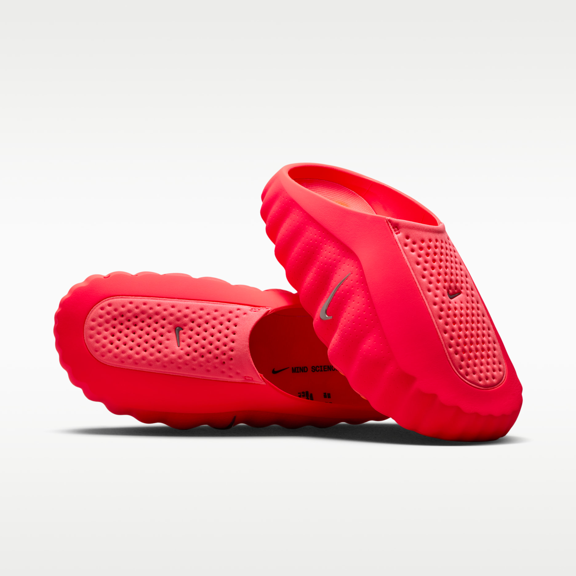 Nike Mind 001 Solar Red men's slides, angled view
