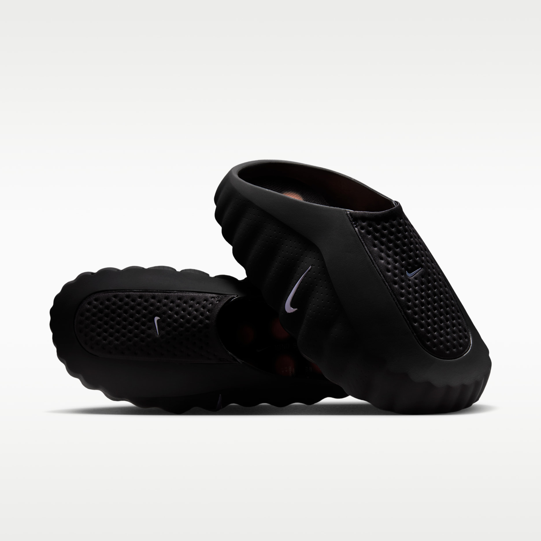 Nike Mind 001 Black slides, angled view