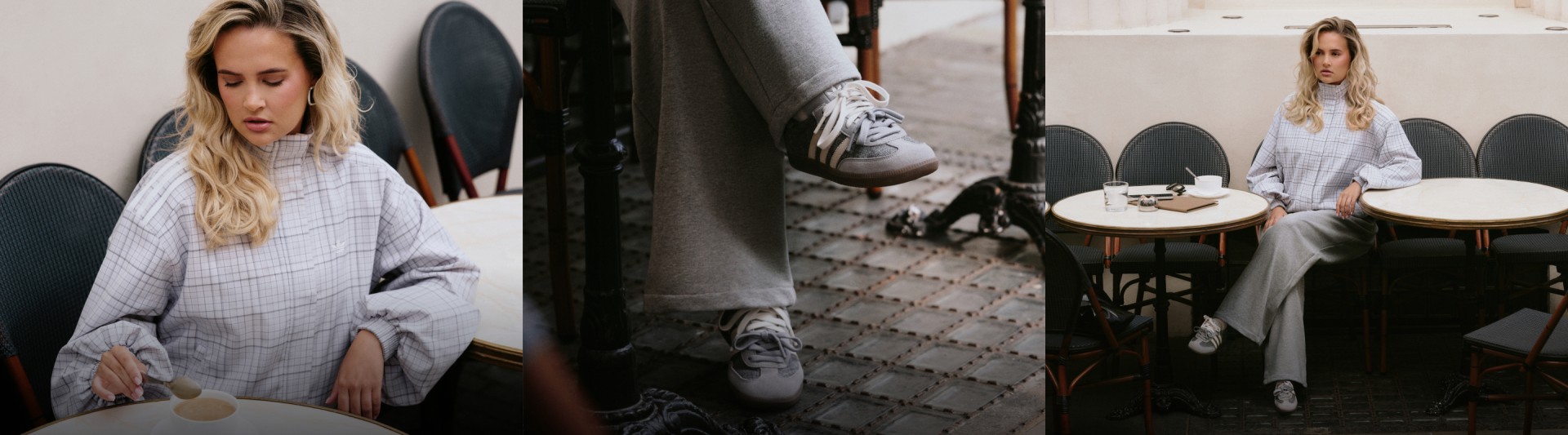 Molly-Mae in a check top and grey trousers at a café table