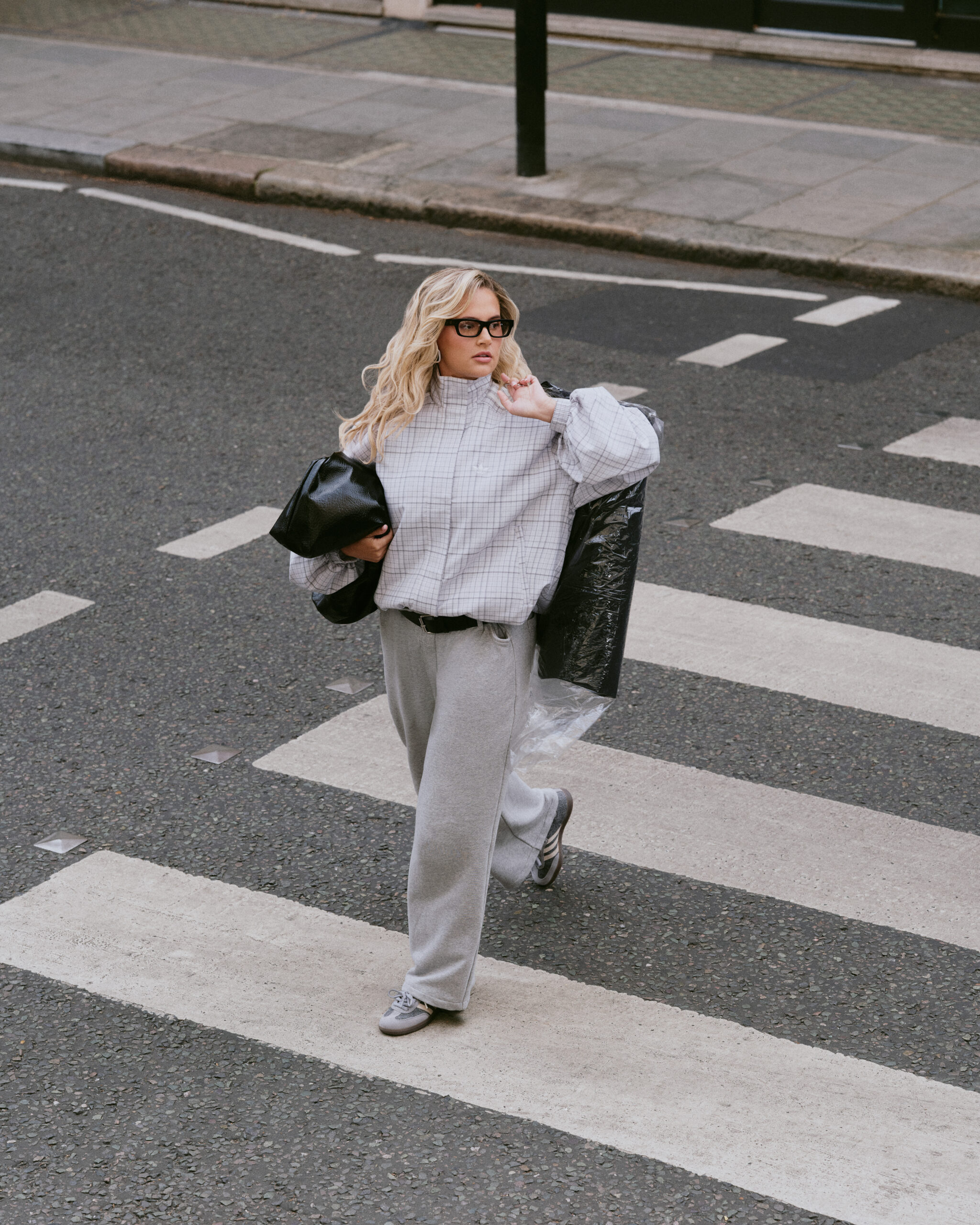 Molly-Mae on a zebra crossing in the adidas Samba Slate
