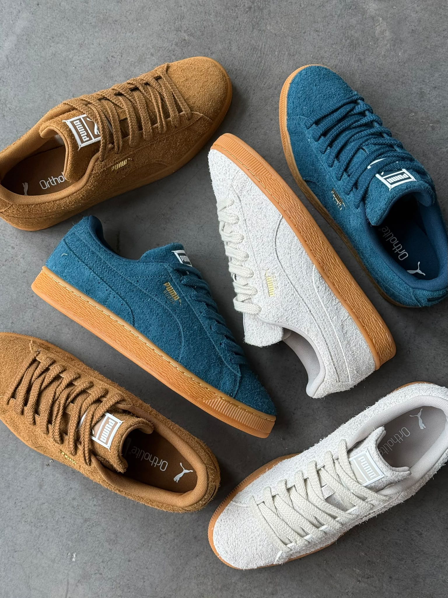 Top-down view of the PUMA Suede Forever showing tongue labels and insoles