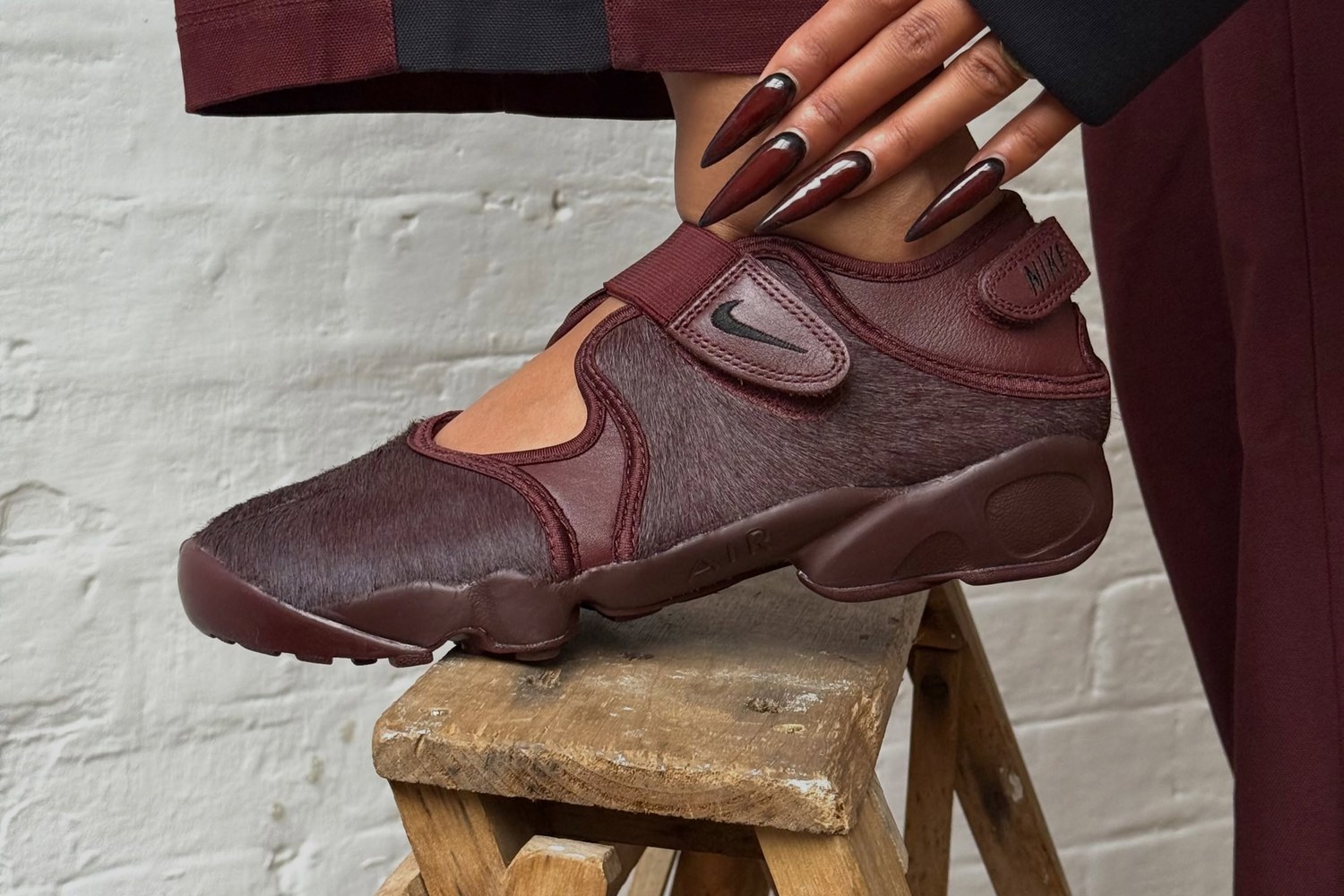 Nike Air Rift in burgundy Mystic Dates pony hair