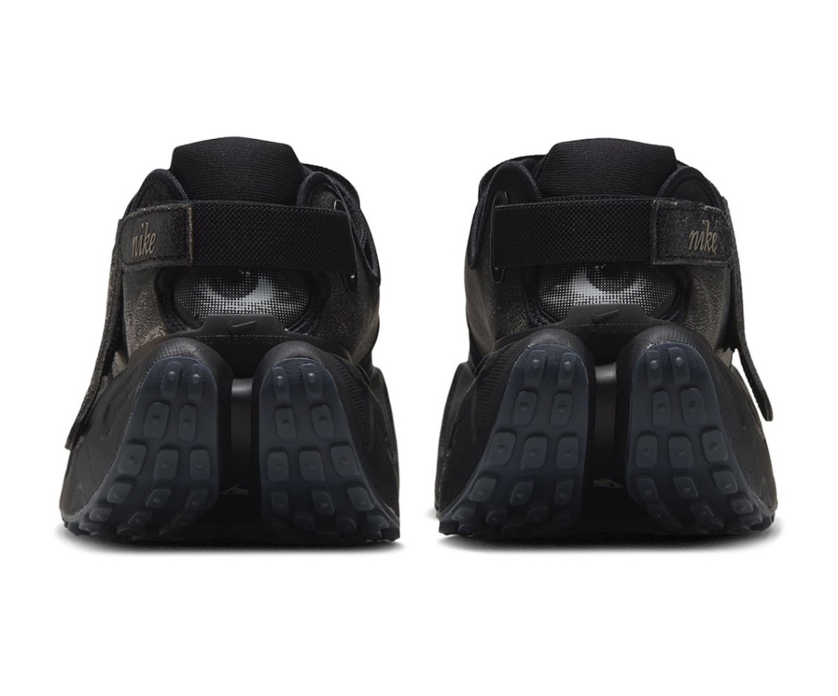 Heel view of the Nike Rift Rocker Black/White with eye graphic