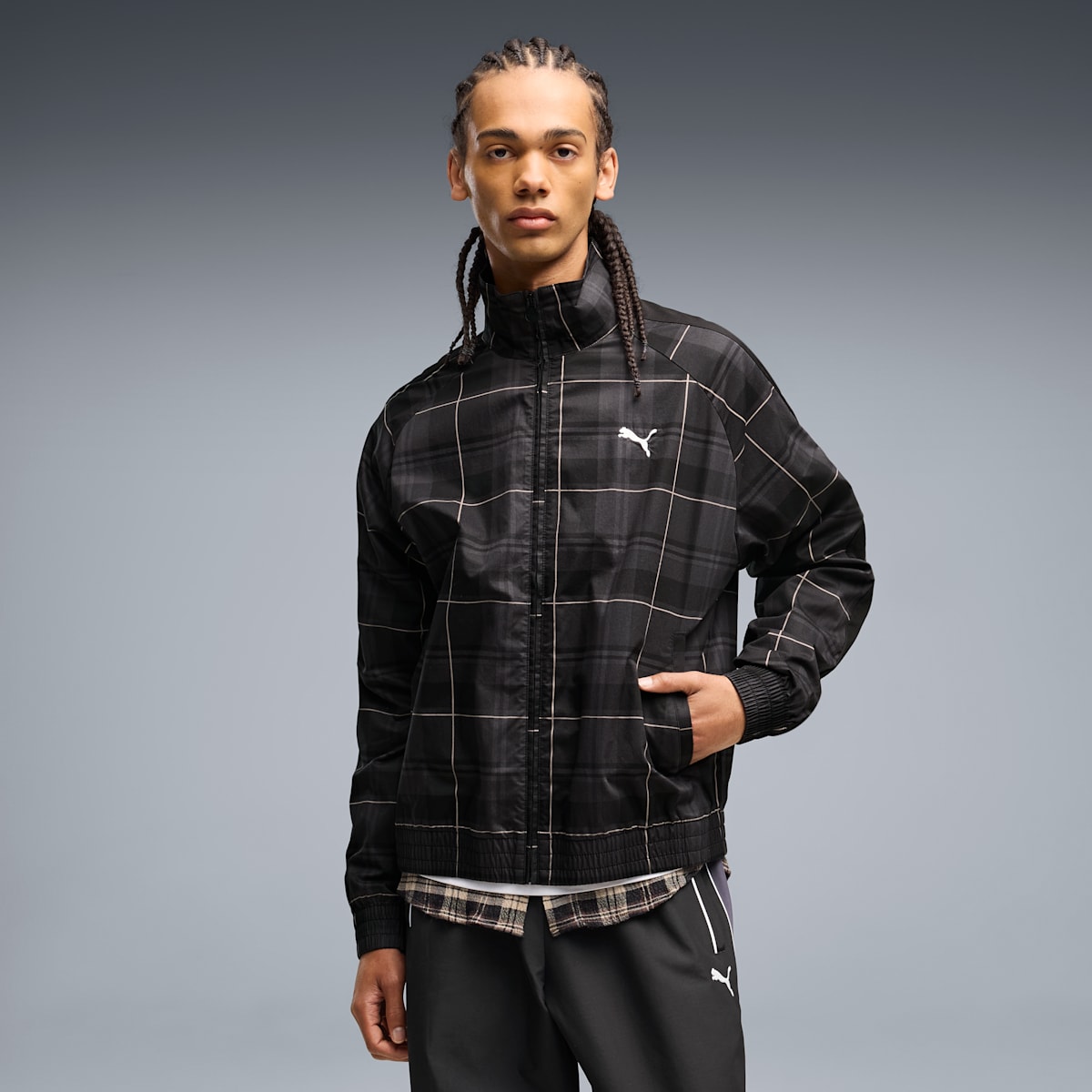 Model wearing the PUMA T7 Relaxed Tartan Track Jacket