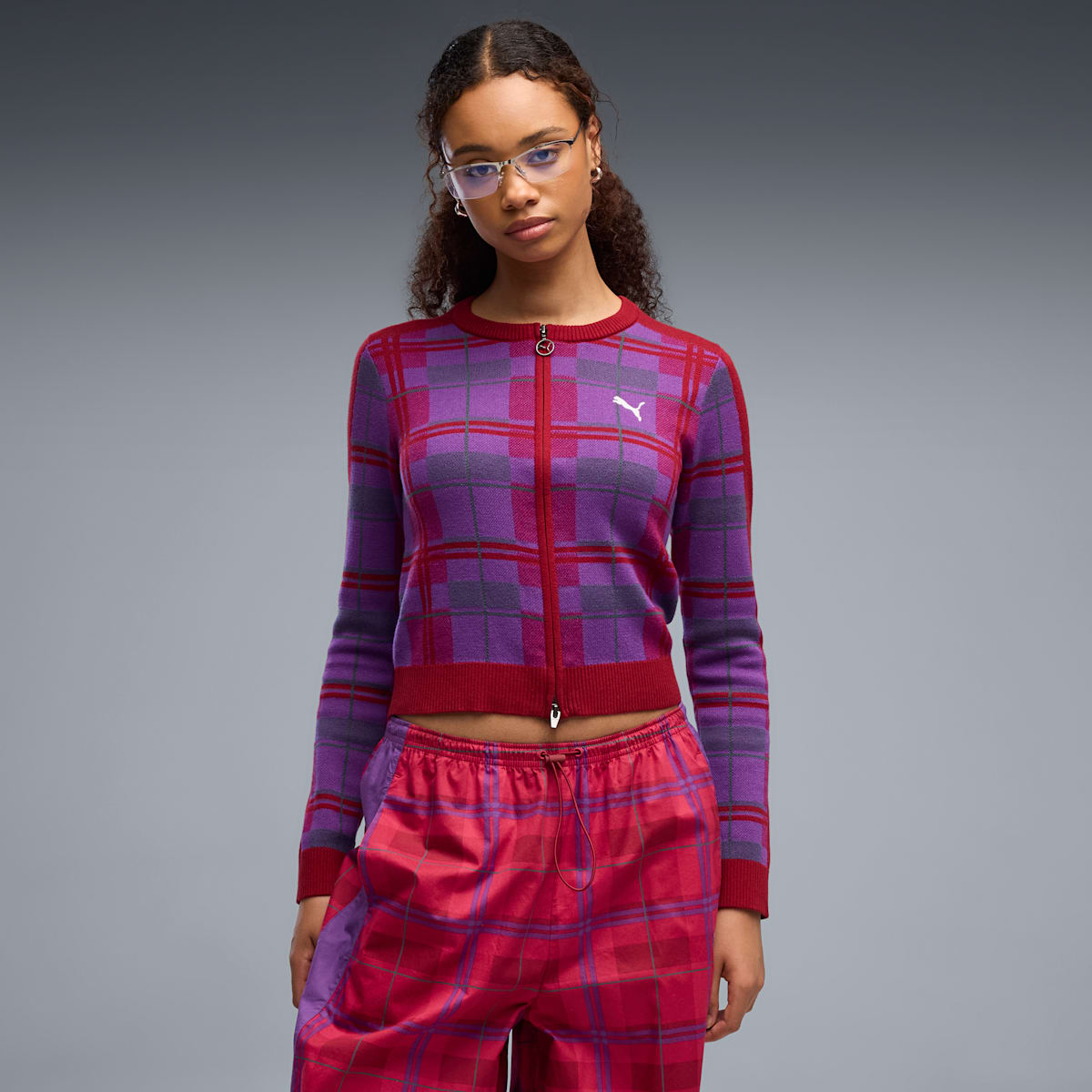Model wearing the PUMA T7 Tartan Slim Knitted Cardigan in Garnet Glow