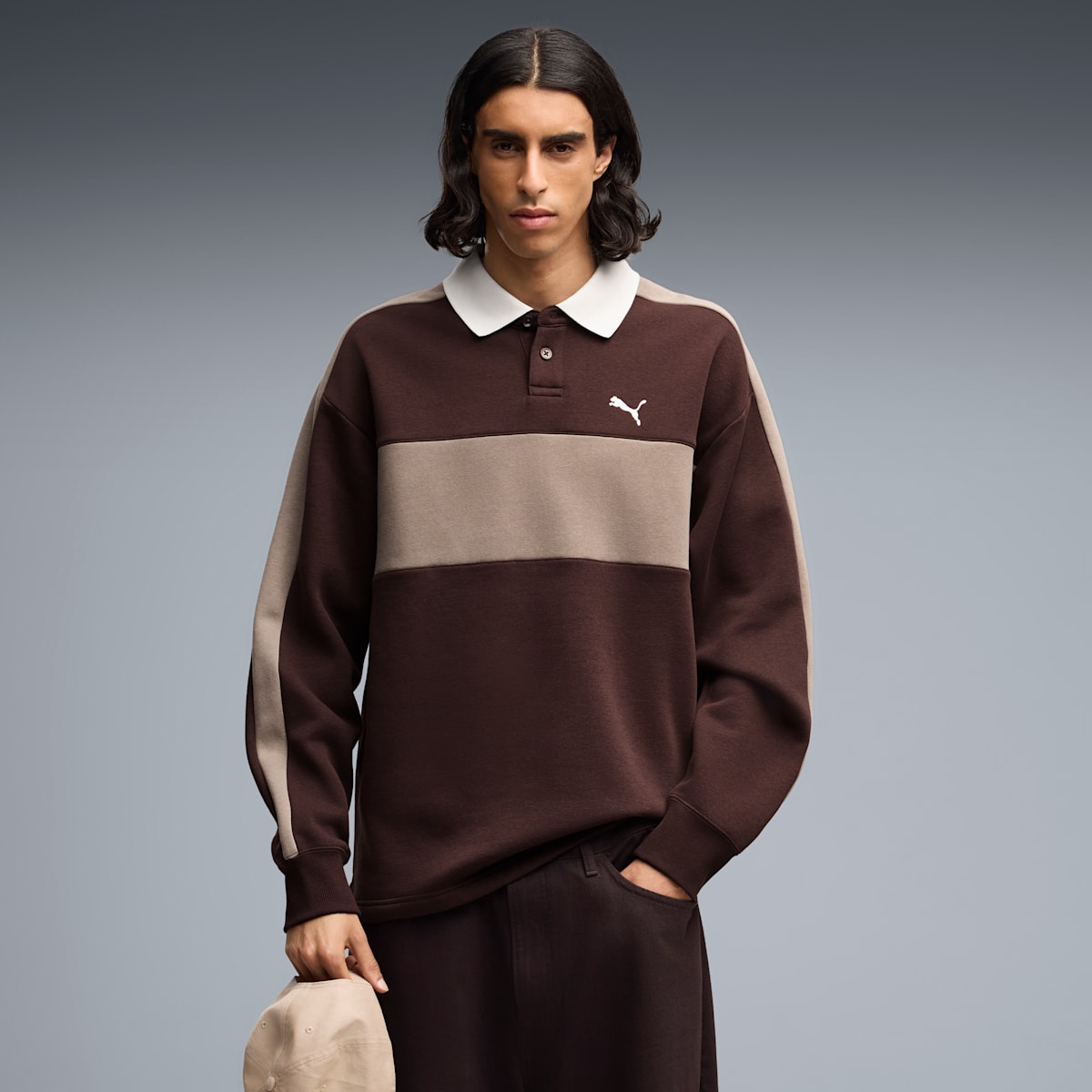 Model wearing the PUMA T7 Relaxed Polo Crew Neck Sweatshirt in Chocolate Fondue