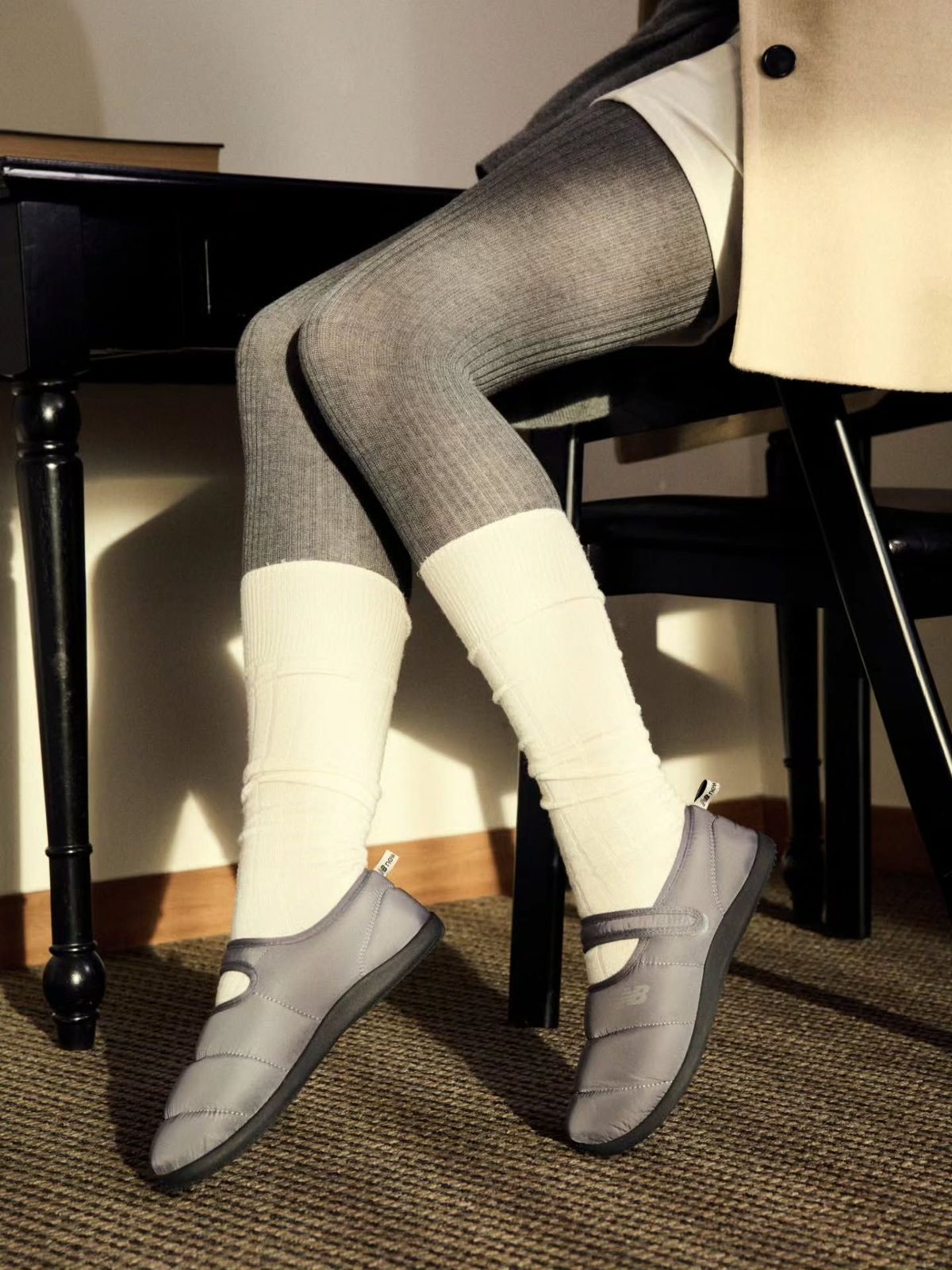 New Balance Sleeping Jane in grey with a strap across the instep