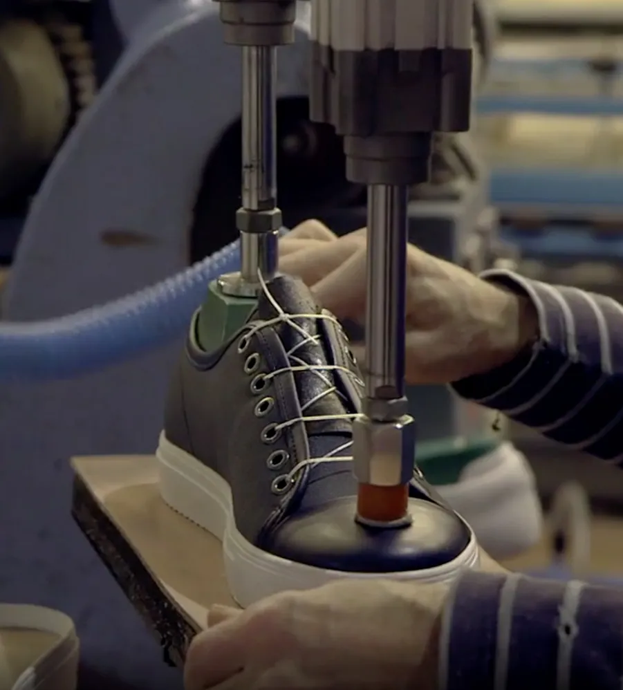 creating axel arigato sneaker in the factory