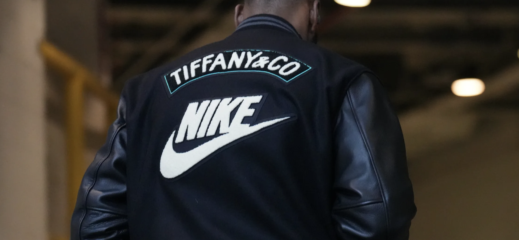 LeBron James in Tiffany x Nike varsity jacket.